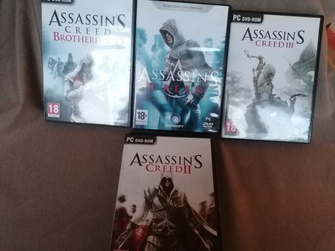 4 Jeux video Pc CD rom windows assasins creed